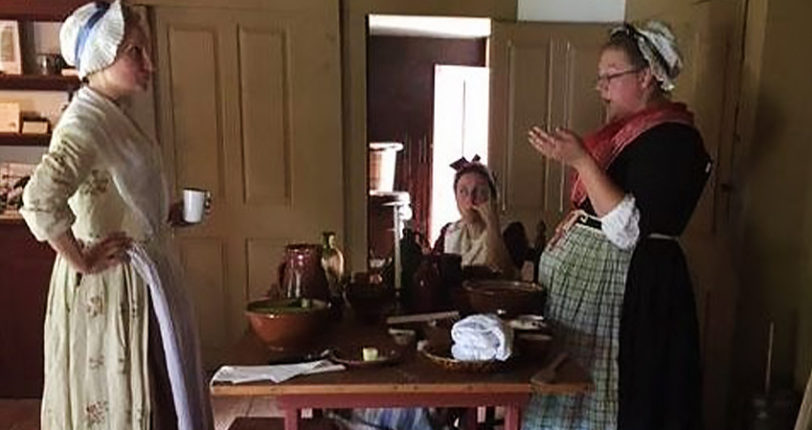 Colonial Women at a table